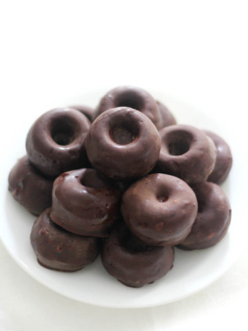 plate of gluten-free chocolate-covered mini doughnuts