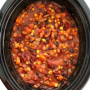 overhead view of slow cooker vegetarian chili in black crockpot