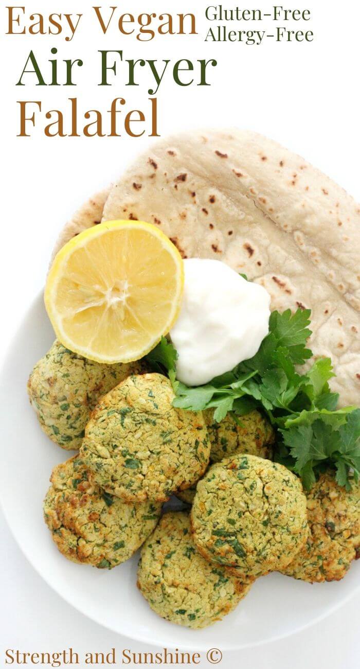 finished plate of healthy air fryer falafel with pita and lemon image text
