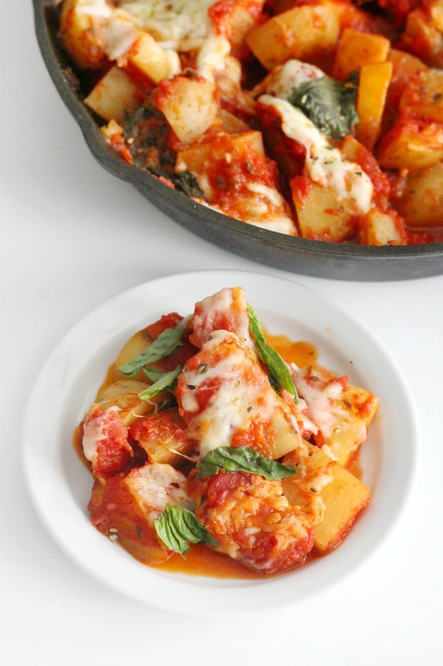 plate and skillet of pizza potatoes