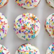 overhead view of gluten-free funfetti cupcakes with vegan buttercream frosting