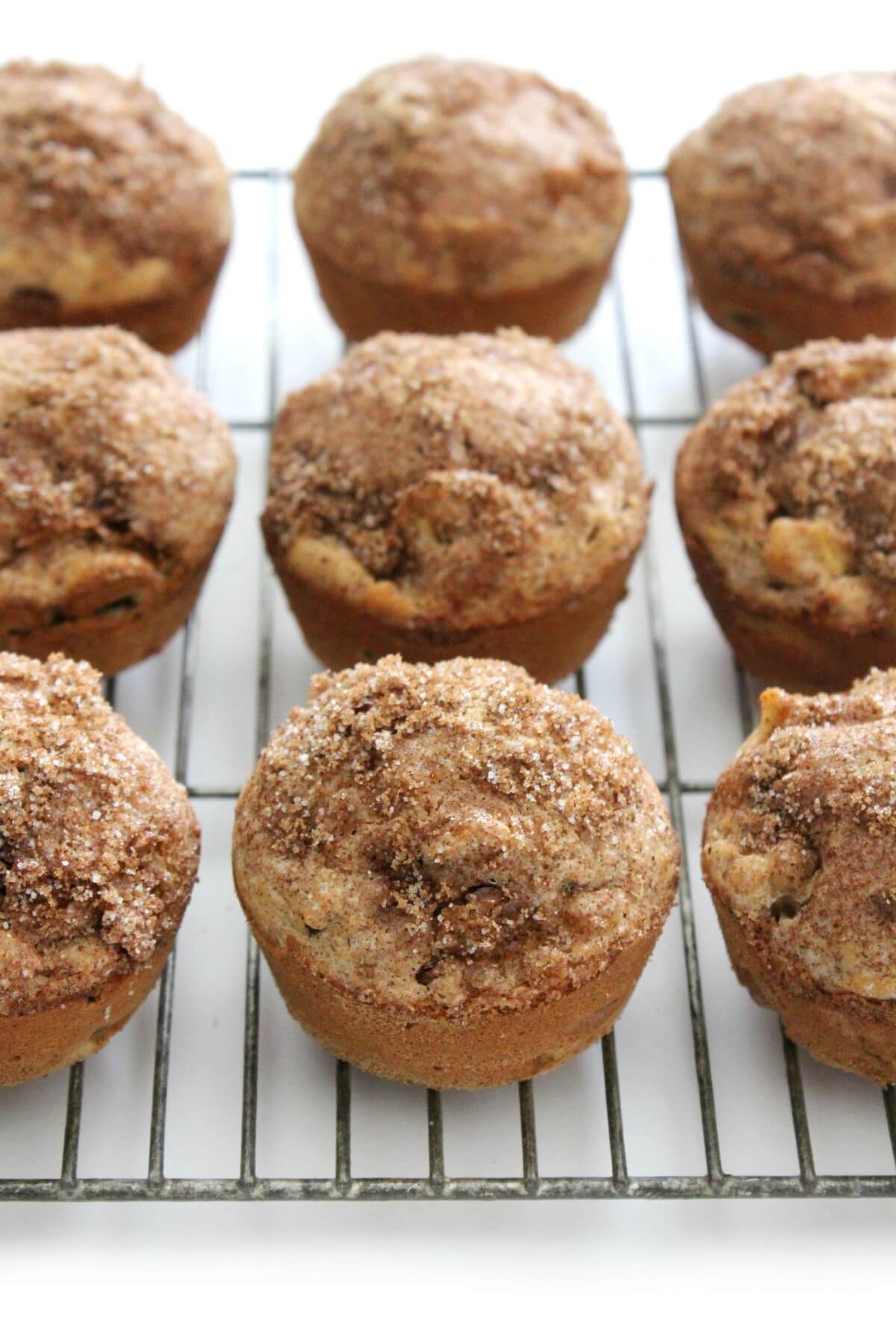 gluten-free apple cinnamon muffins cooling on a wire rack
