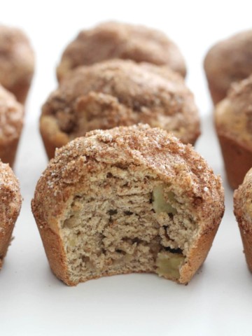 gluten-free apple cinnamon muffin with bite taken out