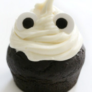 single finished gluten-free ghost cupcake with eyes