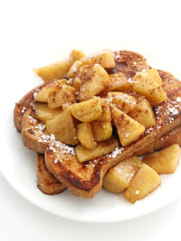 gluten-free apple cinnamon french toast on white plate