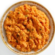 centered overhead image of vegan mashed sweet potatoes in bowl