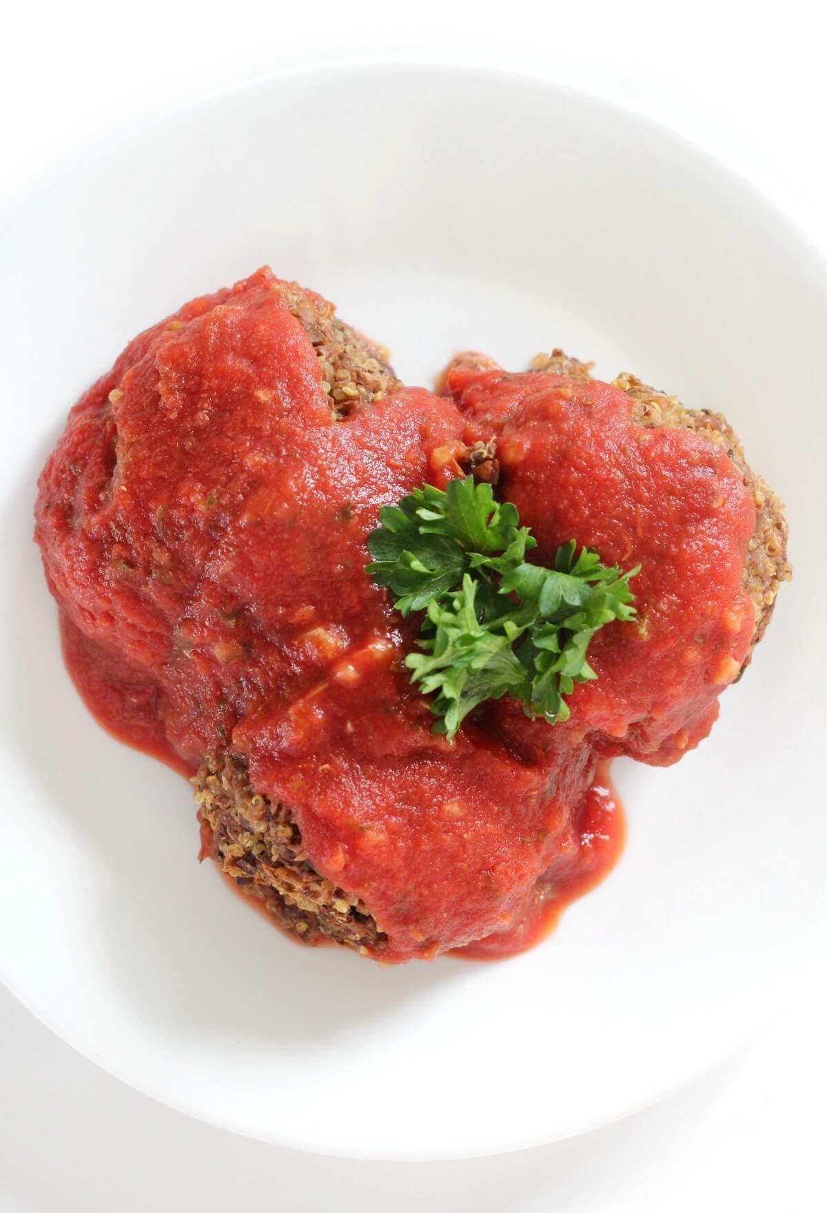 overhead view of sauced covered vegan meatballs