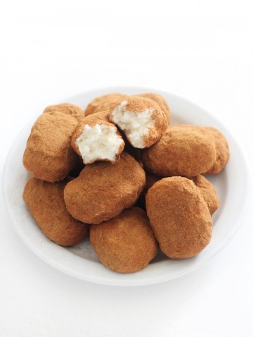 vegan irish potato candy on a white plate