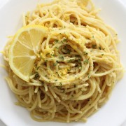 overhead view of vegan pasta al limone on white plate