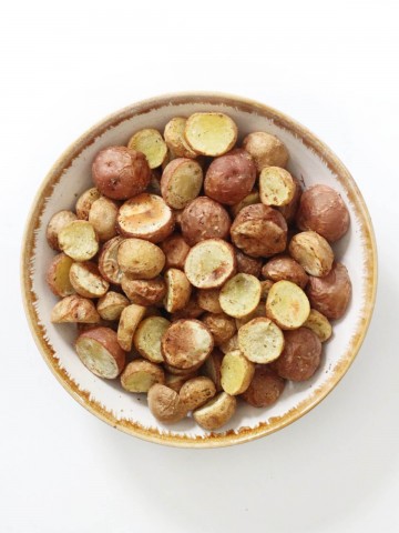 overhead view of bowl with air fryer baby potatoes