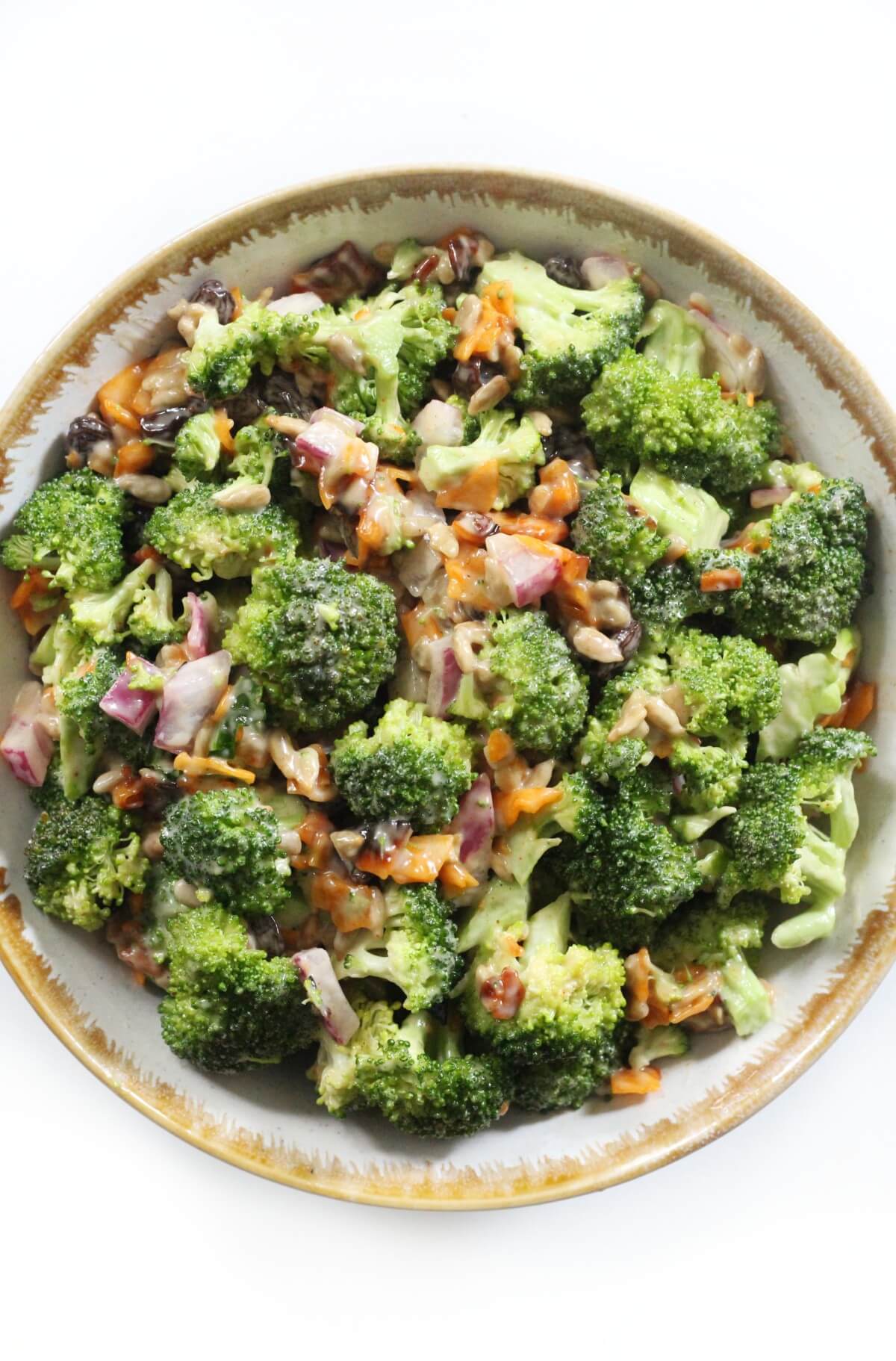 close up overhead shot of vegan broccoli salad in bowl