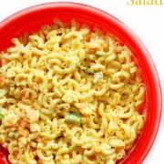 gluten-free Hawaiian macaroni salad in red bowl with image text