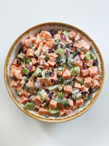 overhead view of serving bowl of sweet potato potato salad