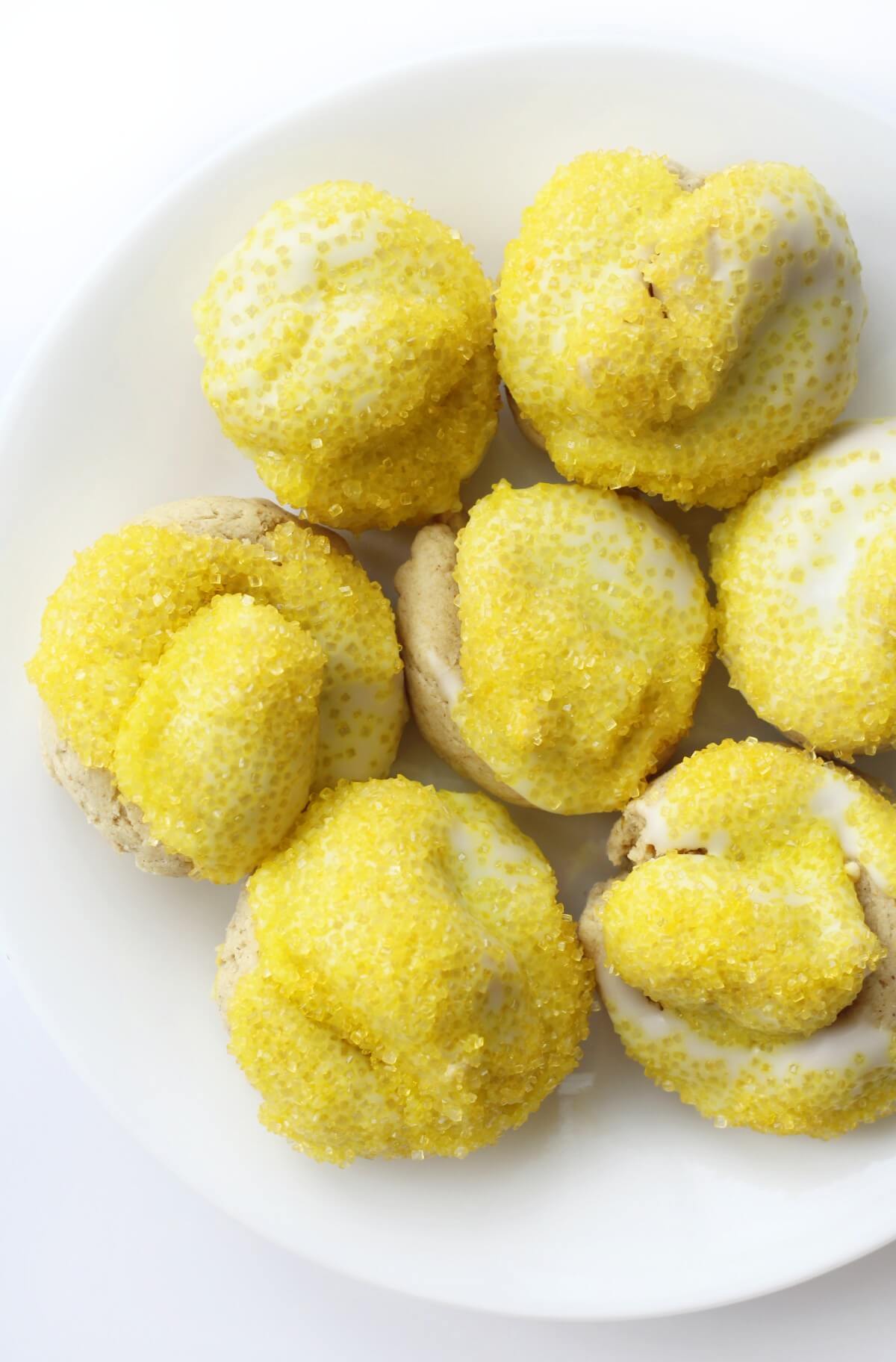 half plate of gluten-free Italian lemon knot cookies with sprinkles