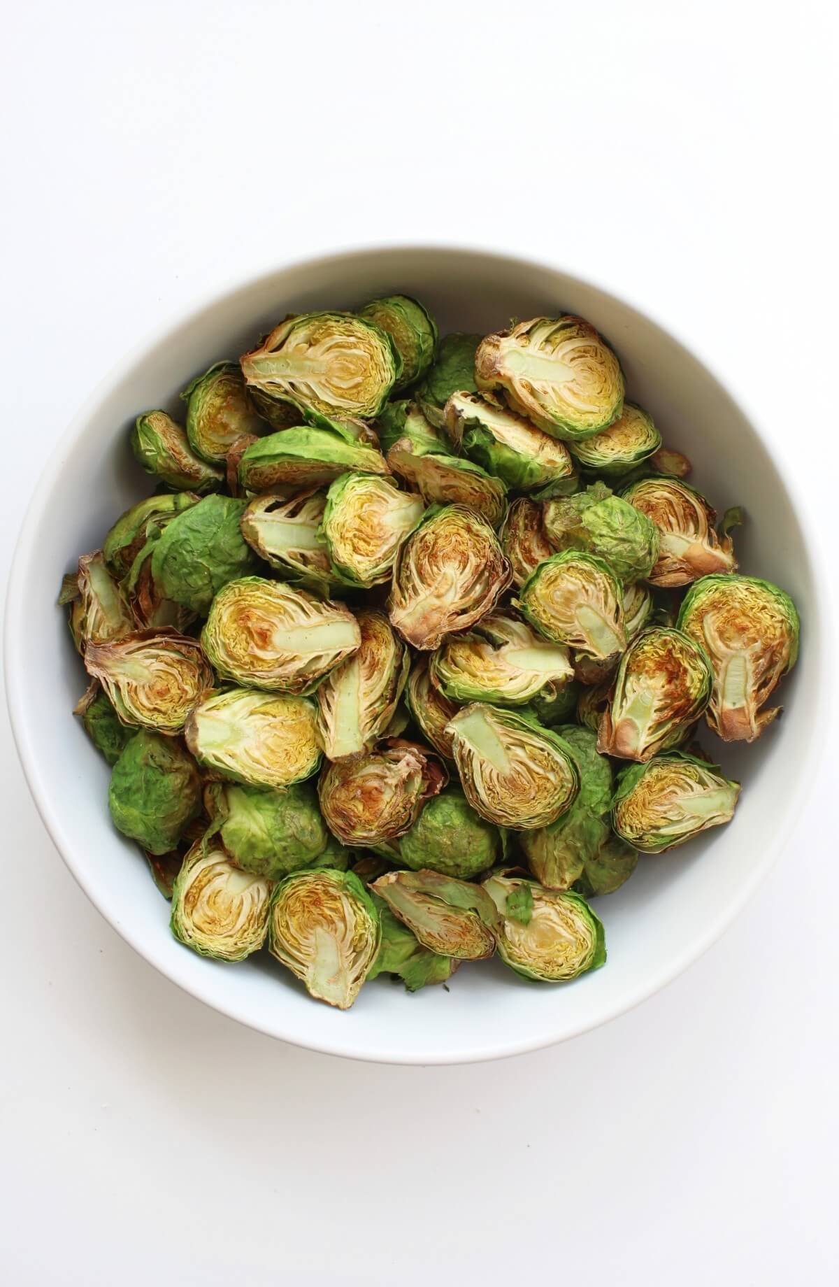 overhead of crispy air fryer brussels sprouts in a bowl