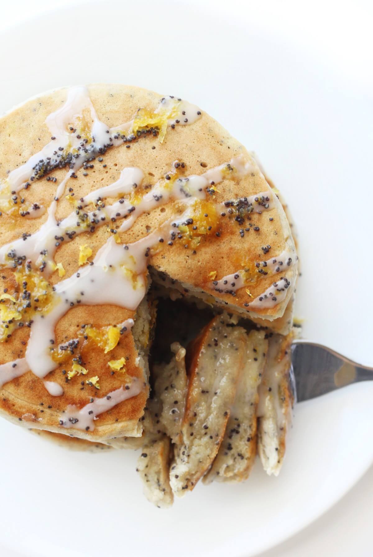 overhead view of lemon poppy seed pancakes with fork