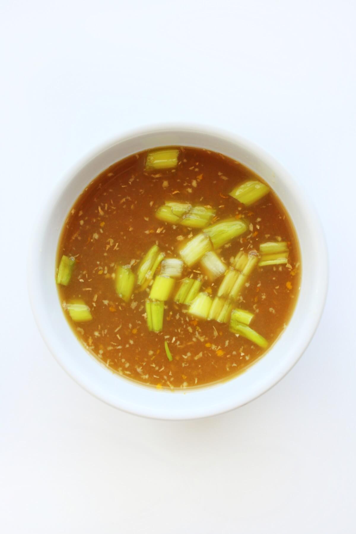 bowl of homemade vegan orange sauce