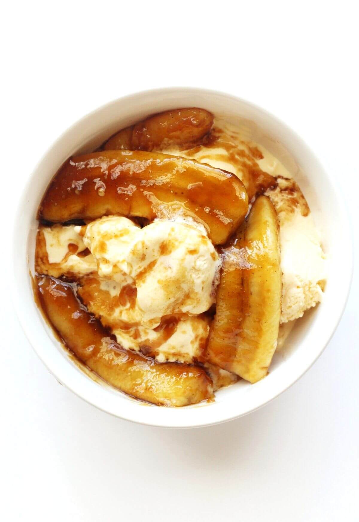 bananas foster with vegan ice cream in white bowl