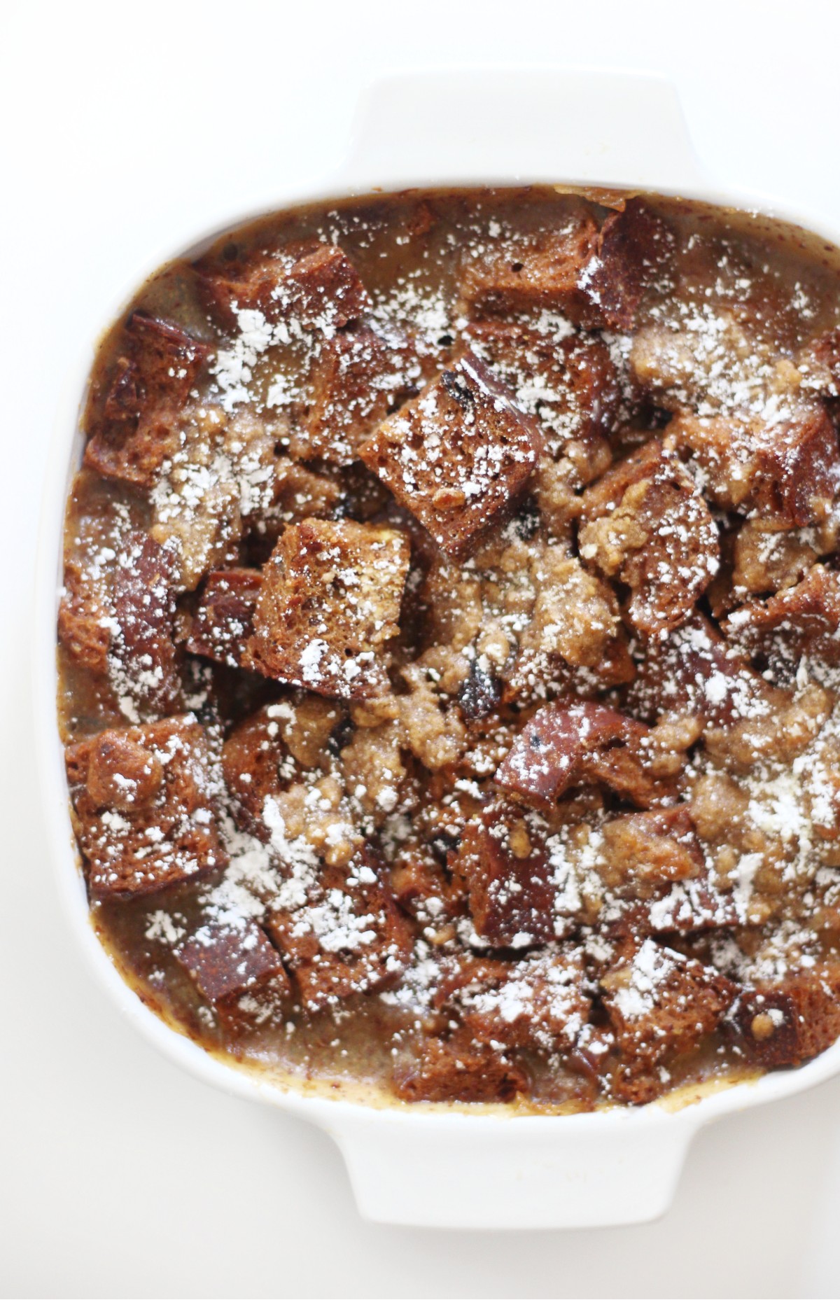overhead close up of gluten-free french toast casserole with powdered sugar