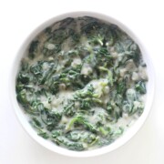 overhead view of vegan creamed spinach in serving bowl