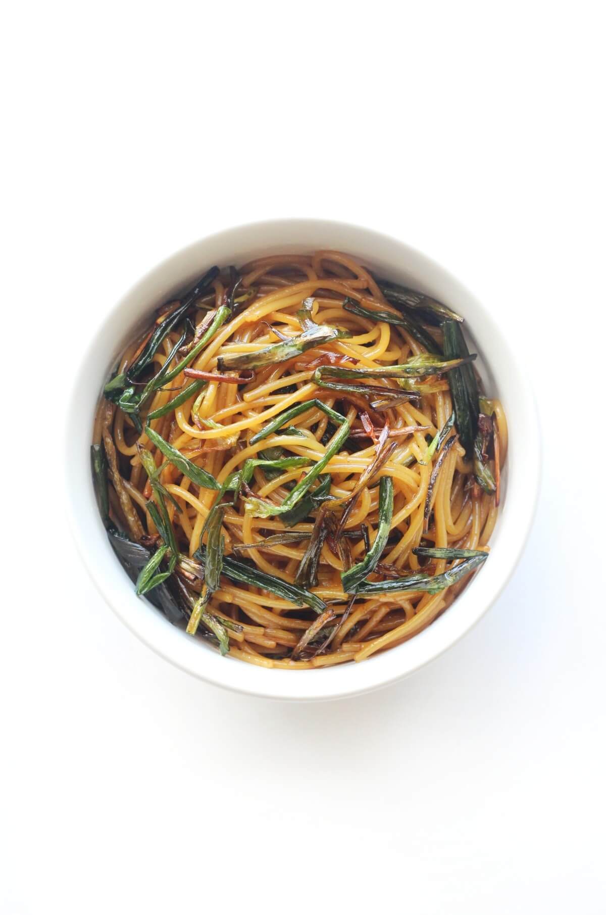 overhead view of bowl with gluten-free scallion oil noodles