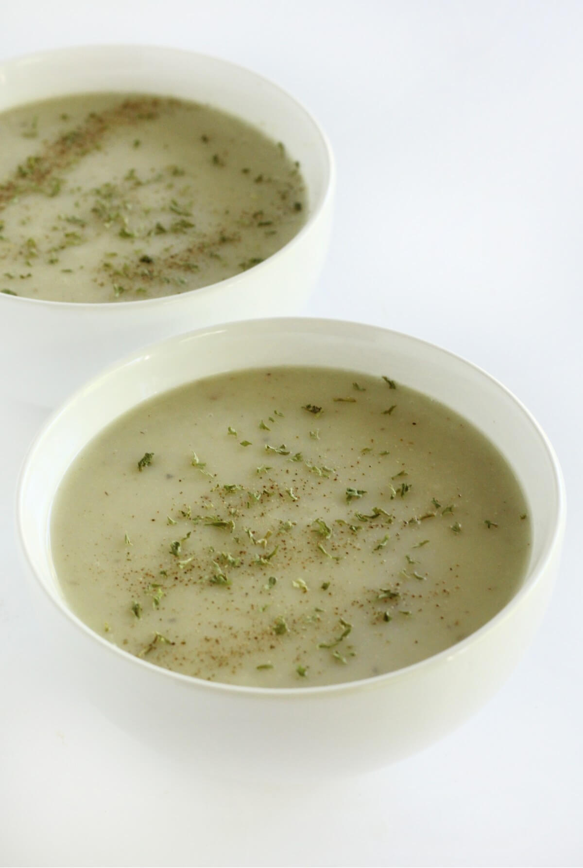 two bowls of cuban cream of malanga soup