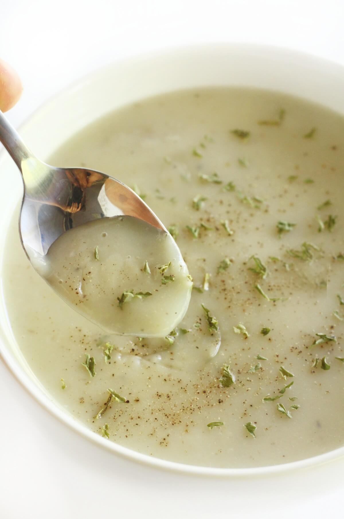 spoon scoop of crema de malanga soup