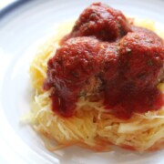 spaghetti squash with bean meatballs on plate.