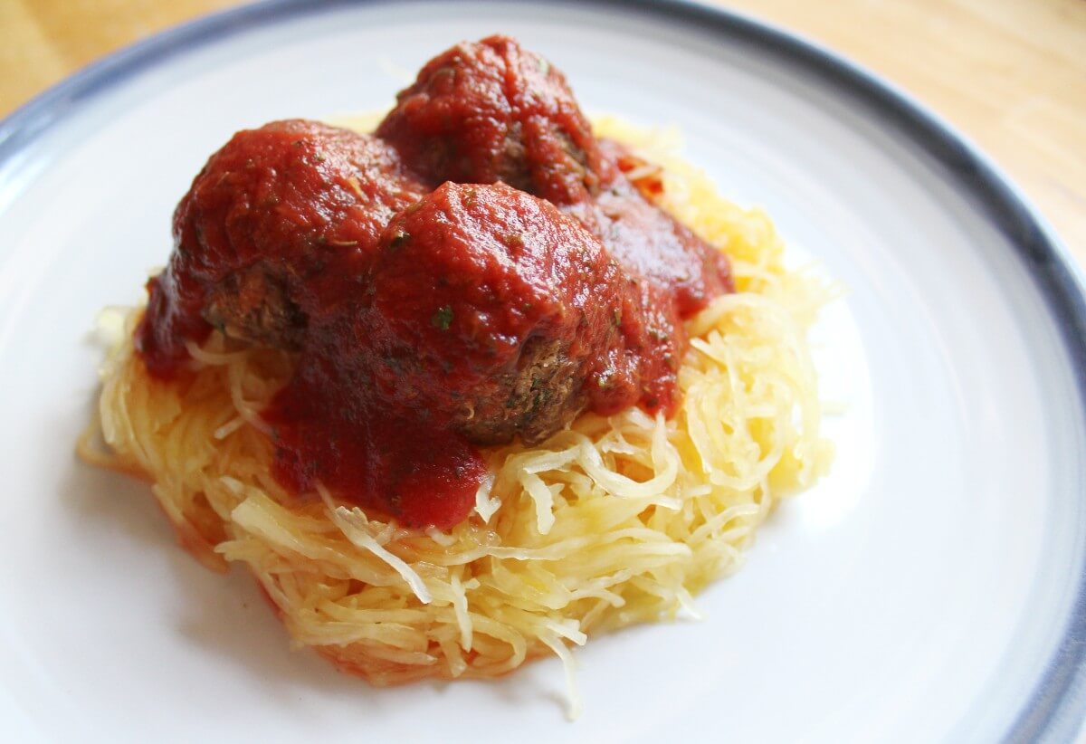 final plate of gluten-free spaghetti squash and bean meatballs with marinara sauce.