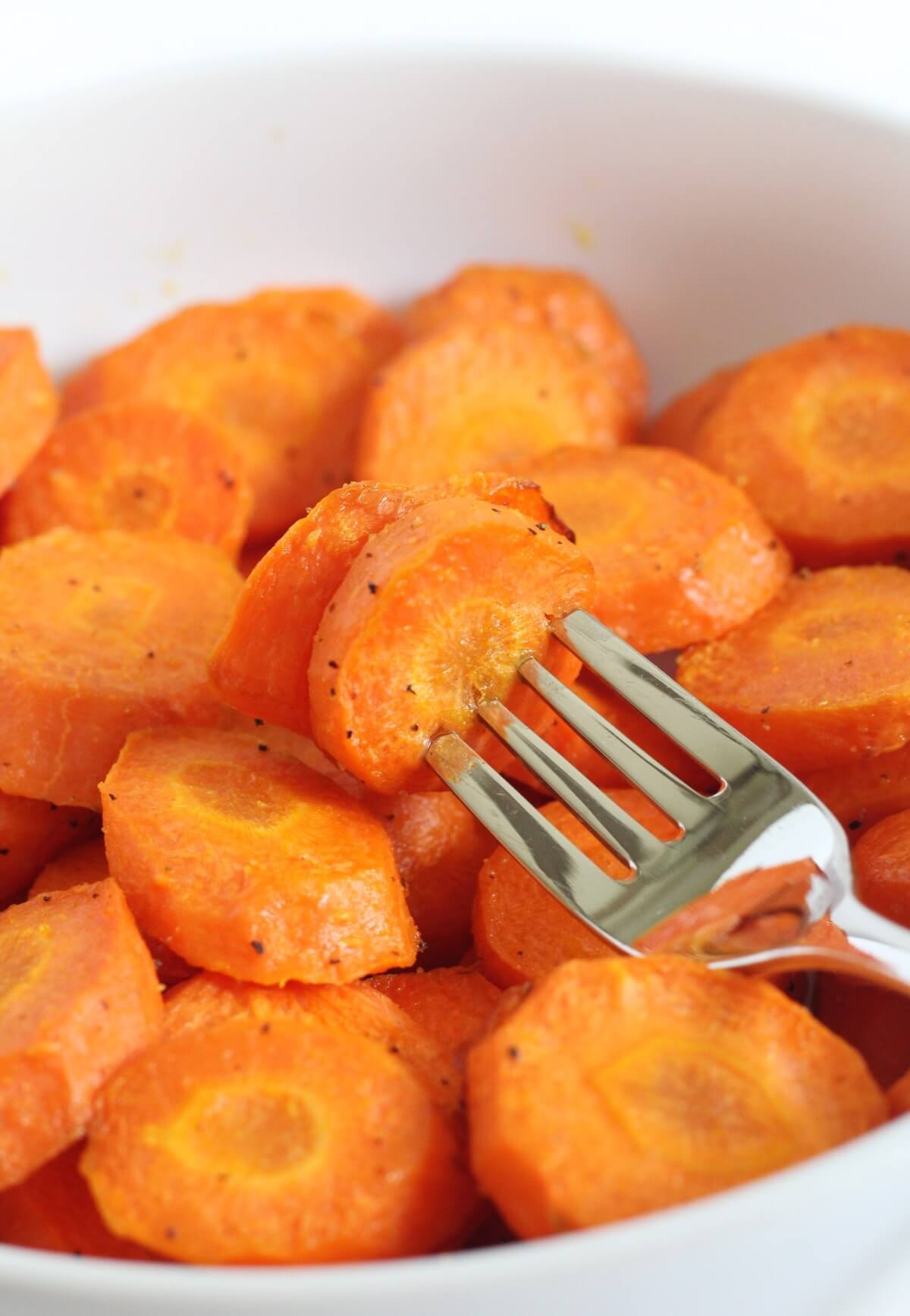 air fryer carrot slices on fork.