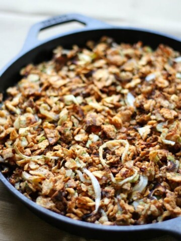 gluten-free vegan green bean casserole in cast iron skillet.