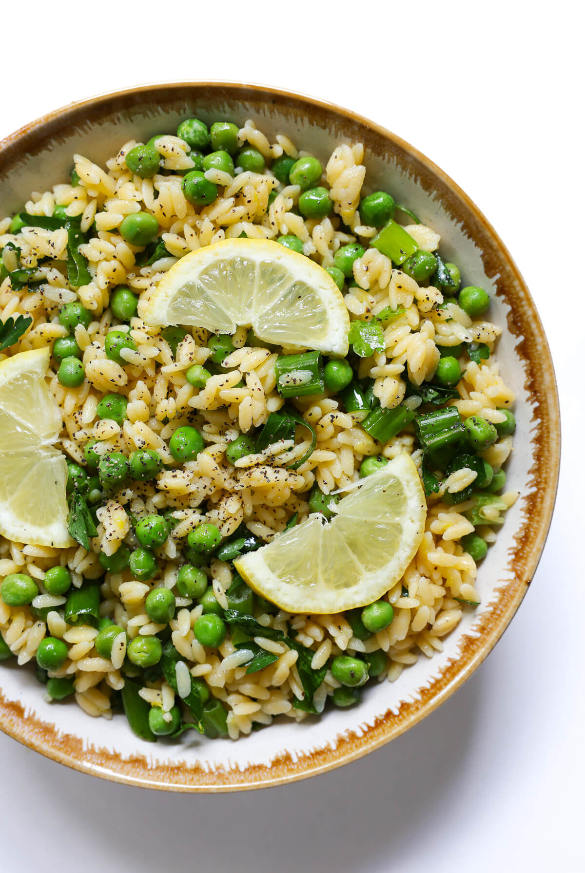 lemony spring pasta salad in bowl.