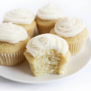 gluten-free vegan vanilla cupcakes on white plate.