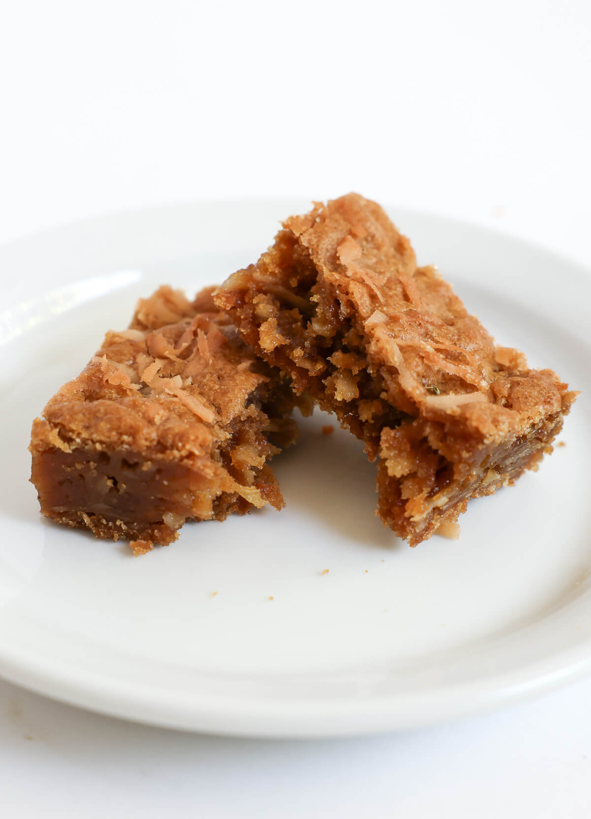 chewy inner texture of coconut blondie bar.