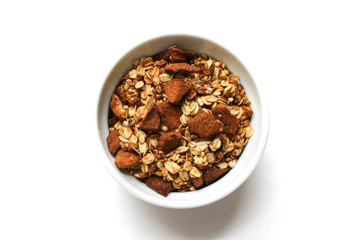 small bowl of gluten-free apple cinnamon granola.