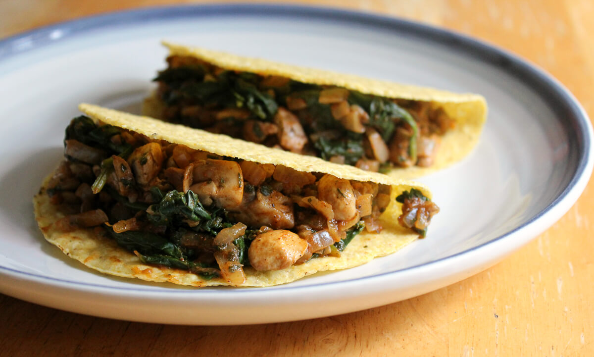 vegan pumpkin lentil tacos in gluten-free corn taco shells.
