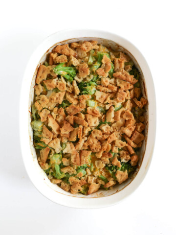 fully baked vegan broccoli casserole in white baking dish.