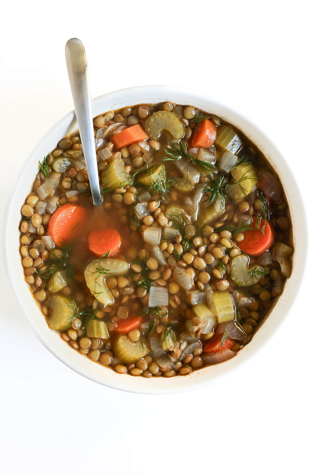 easy vegan lentil soup in bowl with spoon.