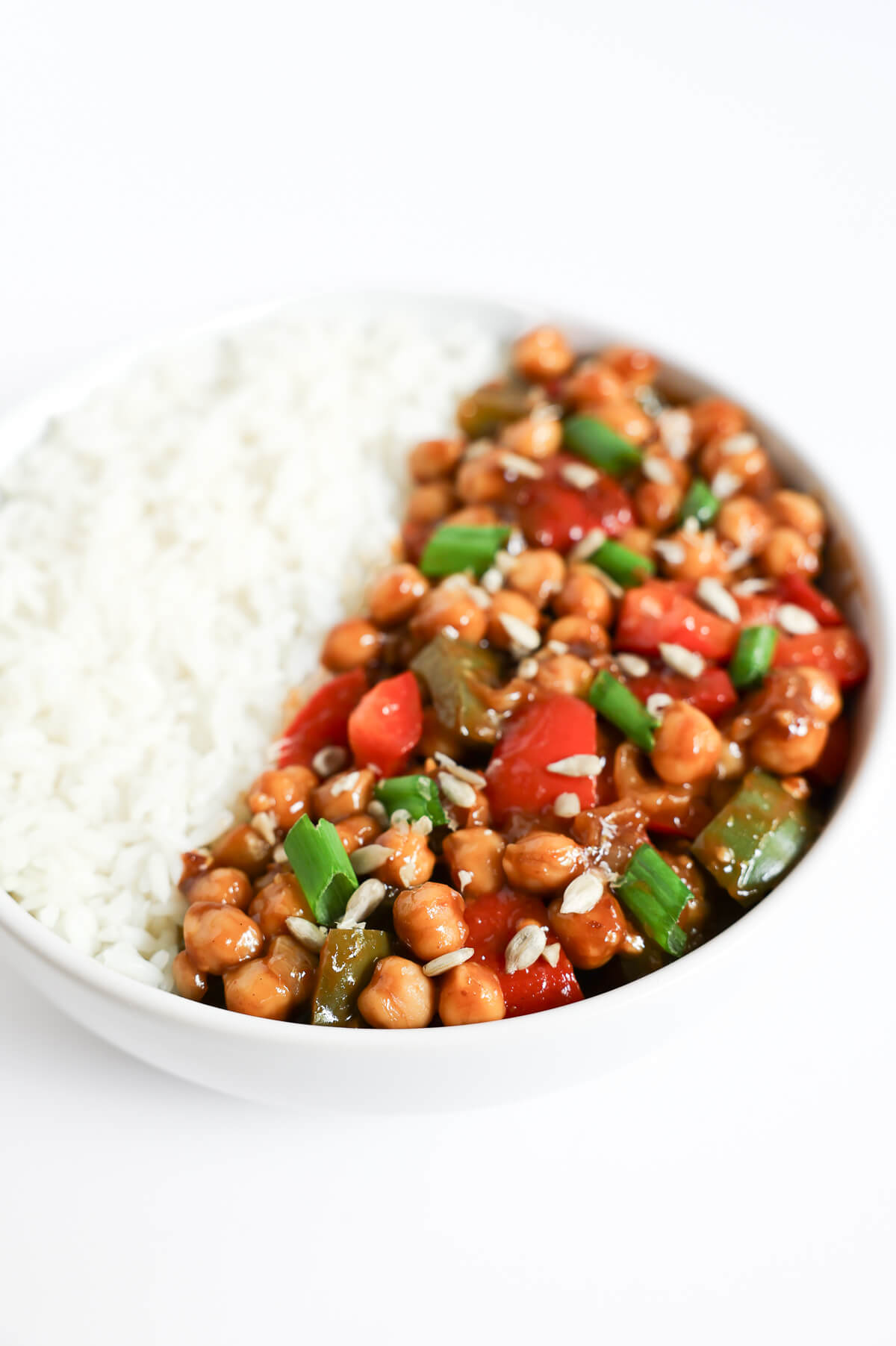 side of bowl with vegan kung pao chickpeas.