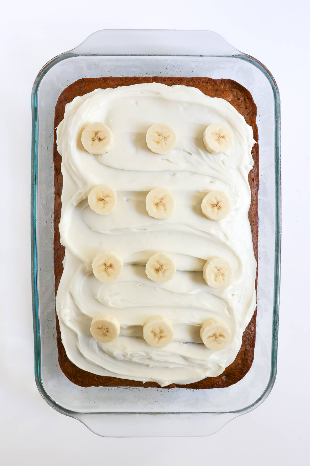 fully baked and decorated gluten-free banana sheet cake.